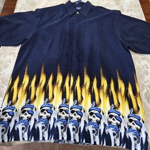 Size XL custom style shirt. Blue background. Side out wear. Flames w skulls.